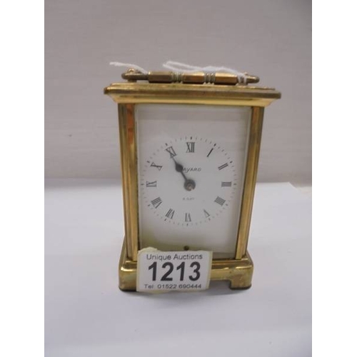 1213 - A brass carriage clock in full working order.