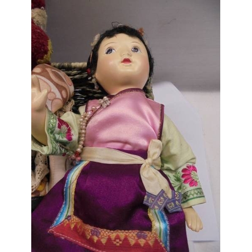 1224 - A Vintage Eastern European composition doll and two Japanese composition dolls.