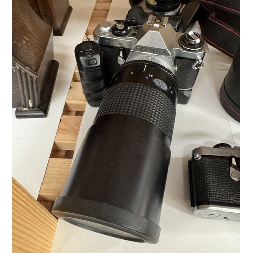 1470 - A good collection of cameras including 3 Pontax ME Super, Pentax MX, Mirror lens 900mm, Troika RMC 5... 