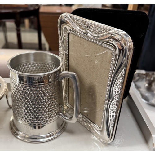 1488 - A set of 3 Lourdes beakers & A selection of silver plate including photograph frame, butter dishes e... 