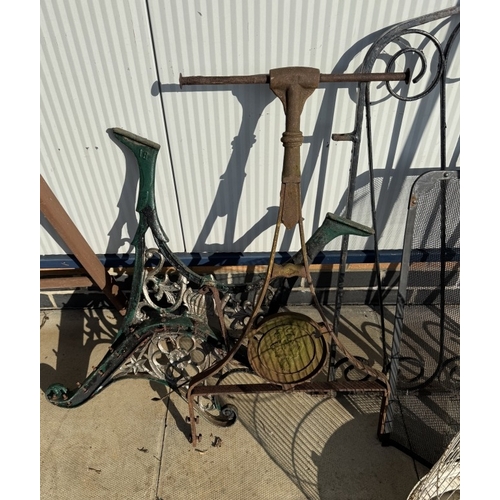 1574 - A quantity of metal items including bird cage, gates, bench ends etc