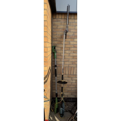 1593 - An electric hedge trimmer with cordless pole pruner