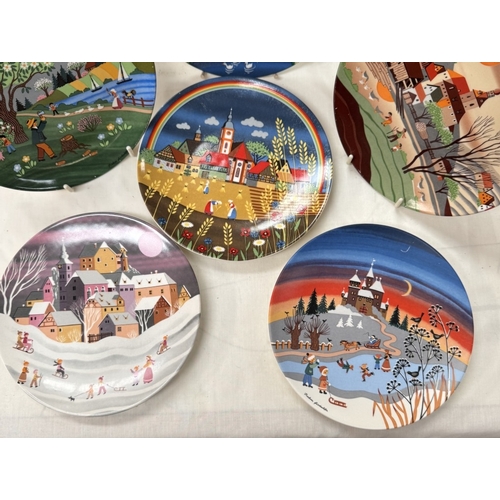 1623 - A collection of Poole pottery, seasons x8 & scenes x3 plates