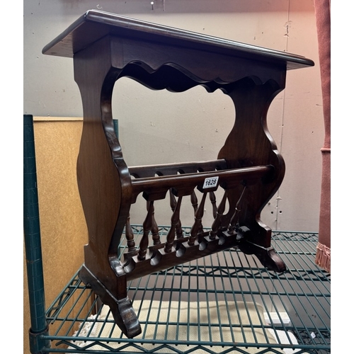 1628 - A dark wood magazine rack side table