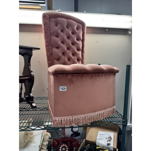 1629 - A deep buttoned pink Draylon bedroom chair