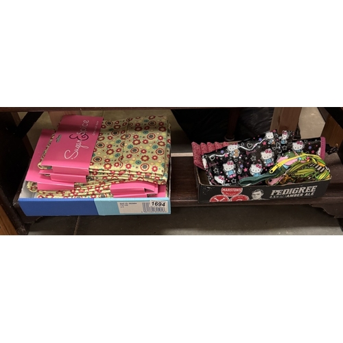 1694 - A quantity of new Habitat card holders, Harrods Kitty purses & Sugar & Spice aprons