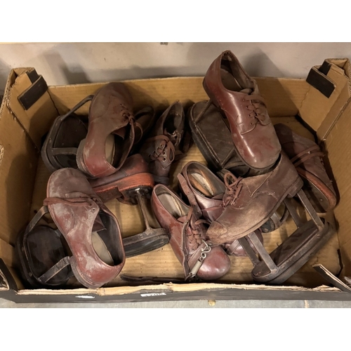 1708 - A quantity of WW1 orthopaedic shoes.