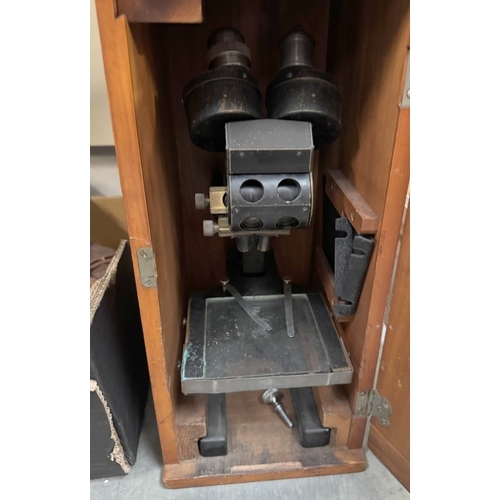 1709 - A cased microscope