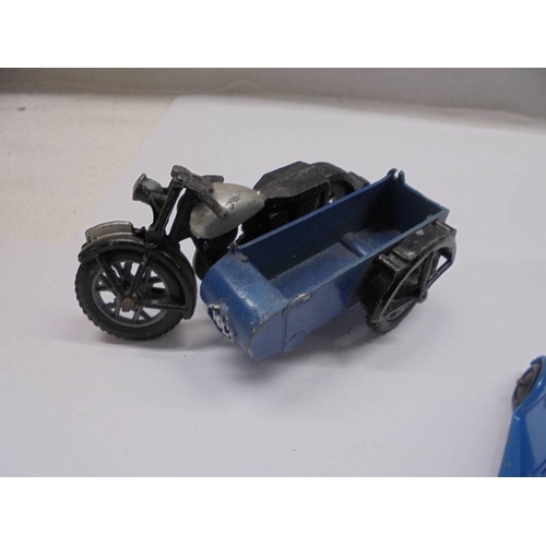 1128 - A collection of Post war Dinky AA & Police motor cycle with sidecars, Auctin 7 etc.,