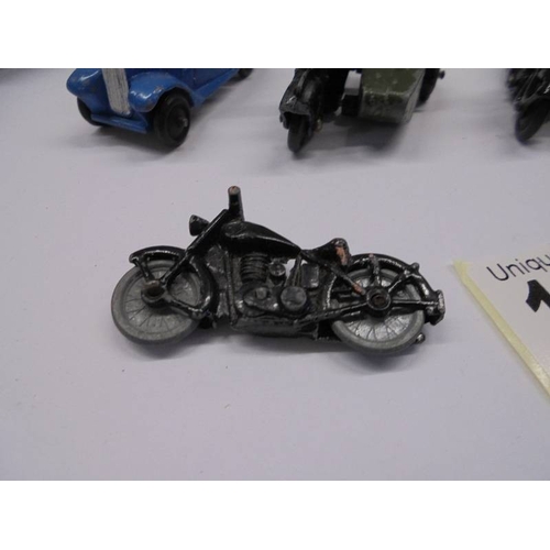 1128 - A collection of Post war Dinky AA & Police motor cycle with sidecars, Auctin 7 etc.,