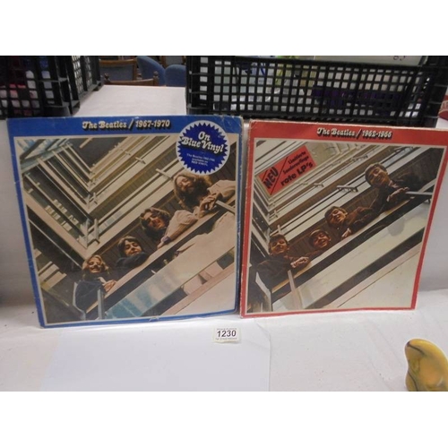 1230 - A Beatles album on red vinyl 1962-1966 (only on disc) and a Beatles album of blue vinyl with two dis... 