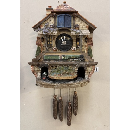 1719 - A Flying Scotsman battery operated wall clock. No pendulum. A/F