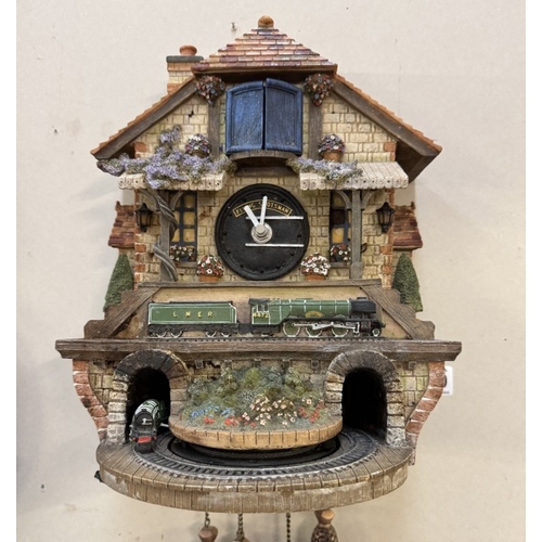 1719 - A Flying Scotsman battery operated wall clock. No pendulum. A/F