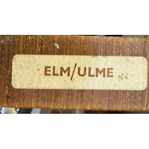 1737 - Some carved wood items. The wood types are represented by the tree shapes. (One with town seals)