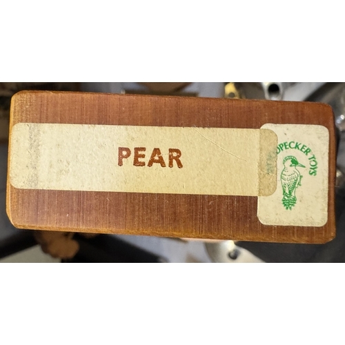 1737 - Some carved wood items. The wood types are represented by the tree shapes. (One with town seals)