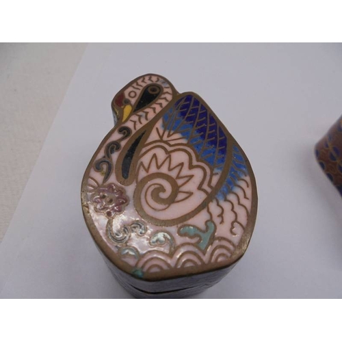 1052 - Five Chinese Cloissonne enamel pill boxes and a handbag mirror.