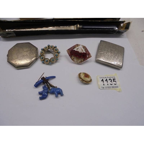 1135 - A mixed lot of costume jewellery, compacts, rolled gold cuff links etc.,