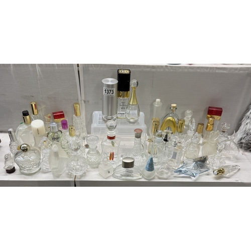 1373 - A large lot of empty glass perfume bottles