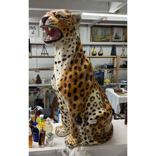 1376 - A large ceramic leopard big cat. (Restoration to 1 foot) Height 82cm