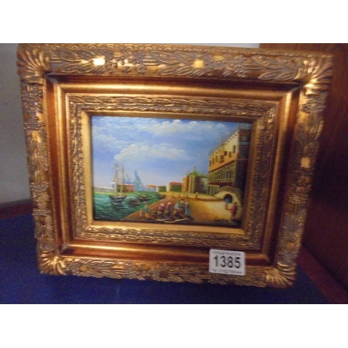 1385 - A small gilt framed Venetian scene.