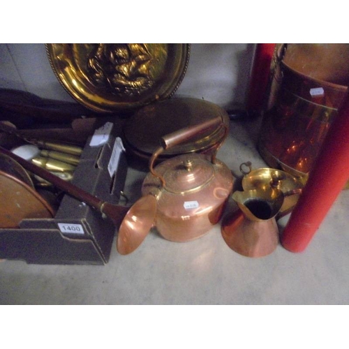 1400 - A good lot of 19th and 20th century copper and brass including kettle, jam pan, shell cases etc.,