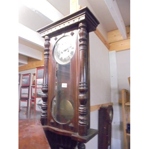 1405 - A 19th century mahogany wall clock.