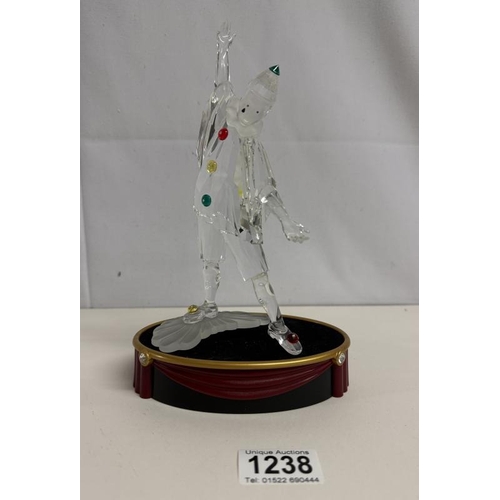 1238 - A boxed Swarovski Pierrot figurine with stand