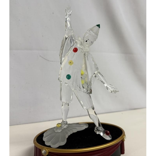 1238 - A boxed Swarovski Pierrot figurine with stand