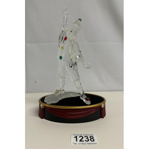 1238 - A boxed Swarovski Pierrot figurine with stand