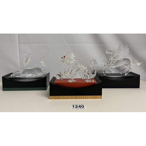 1240 - A set of 3 boxed Swarovski SCS Fabulous Creatures in boxes with stands