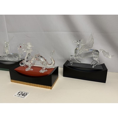 1240 - A set of 3 boxed Swarovski SCS Fabulous Creatures in boxes with stands