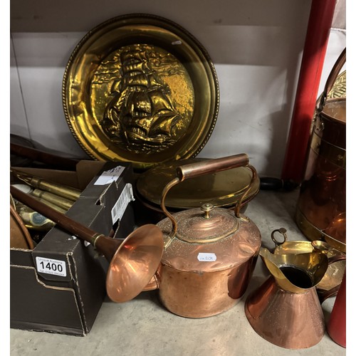 1400 - A good lot of 19th and 20th century copper and brass including kettle, jam pan, shell cases etc.,