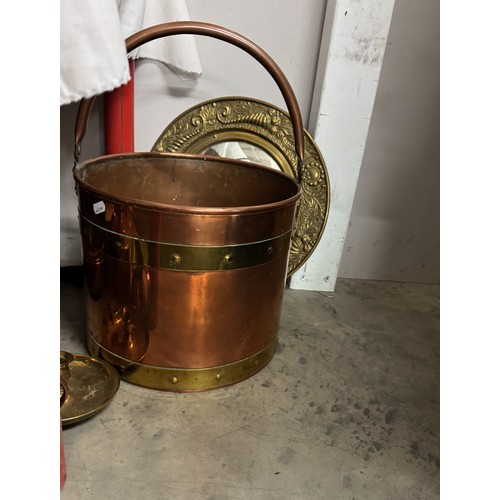 1400 - A good lot of 19th and 20th century copper and brass including kettle, jam pan, shell cases etc.,