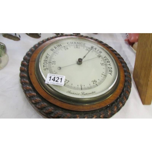 1421 - A good barometer with rope twist case.