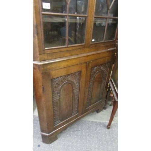 1434 - A good quality oak astragal glazed corner cabinet.