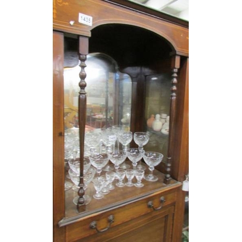 1435 - An Edwardian mahogany inlaid display cabinet.