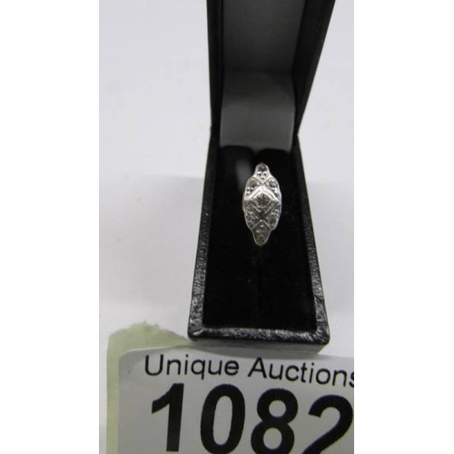 1082 - An art deco diamond ring circa 1920/30's in 18ct gold, size N, 2.97 grams.