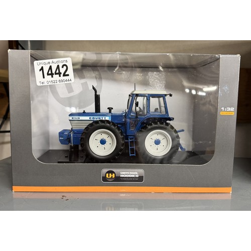 1442 - A Universal Hobbies 1/32 1425 Ford County tractor.