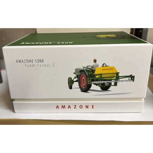 1450 - A boxed Univeral Hobbies UH6021 Amazone S300 Fendt Farmer and 6036 Landini Velite.