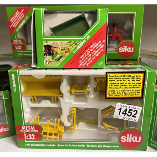 1452 - 7 boxed Siku agricultural vehicles Nos. 3652, 3653, 2070, 7070, 3470,02884 and 3095