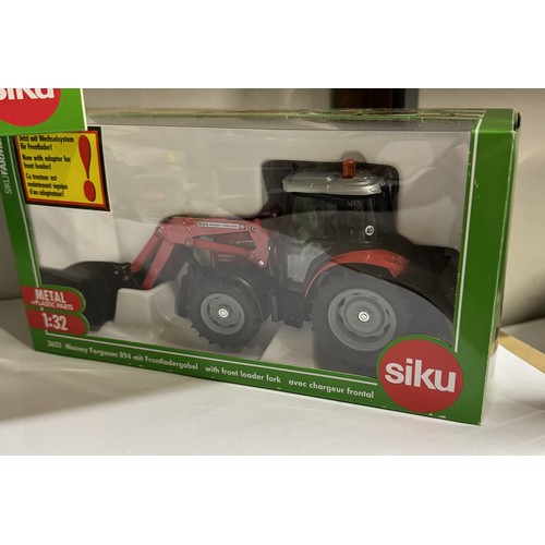 1452 - 7 boxed Siku agricultural vehicles Nos. 3652, 3653, 2070, 7070, 3470,02884 and 3095