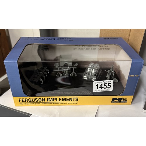 1455 - A boxed Universal Hobbies 1/32 Ferguson TEA20 a four piece implement set.