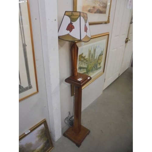 1470 - An art deco floor standing pedestal lamp with later shade.