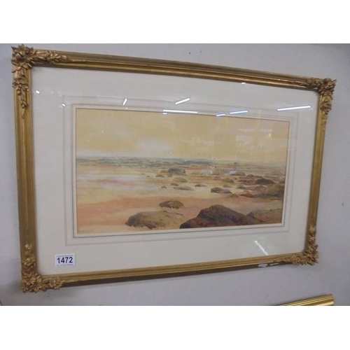 1472 - A framed and glazed watercolour beach scene signed Frank Angell.