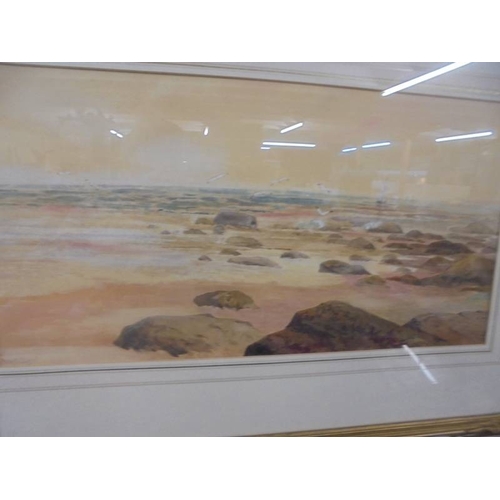 1472 - A framed and glazed watercolour beach scene signed Frank Angell.