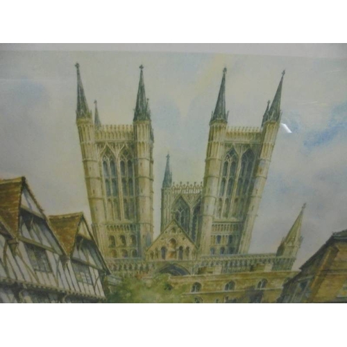 1473 - A framed and glazed limited edition print of Lincoln Cathedral by E Sturgeon.