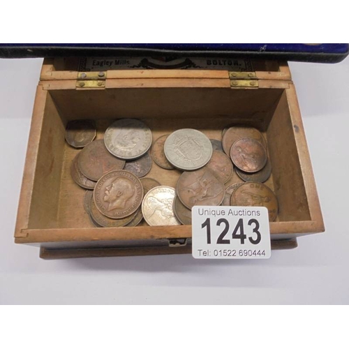 1243 - A mixed lot of coins including cased set of copper pennies.