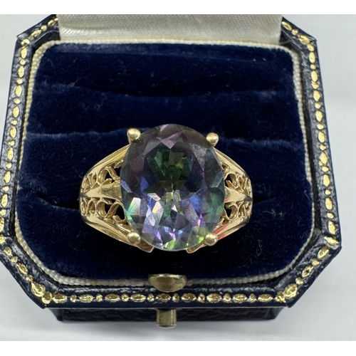 1100G - A 9ct gold ring set pale blue stone. Size T half. 5.13 grams