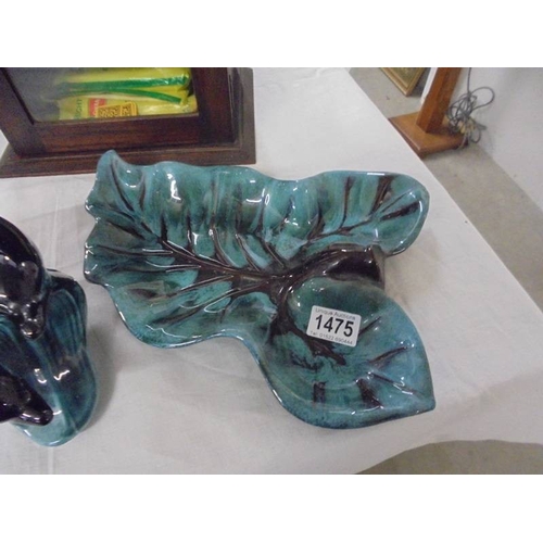 1475 - A Poole pottery dolphin and a large Canada Blue Mountain maple leaf dish.