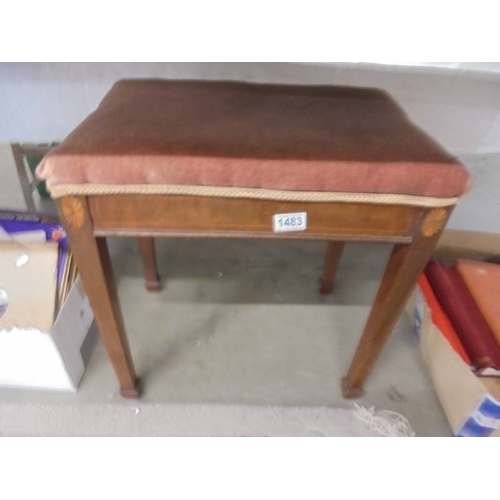 1483 - An Edwardian inlaid piano/bedroom stool.